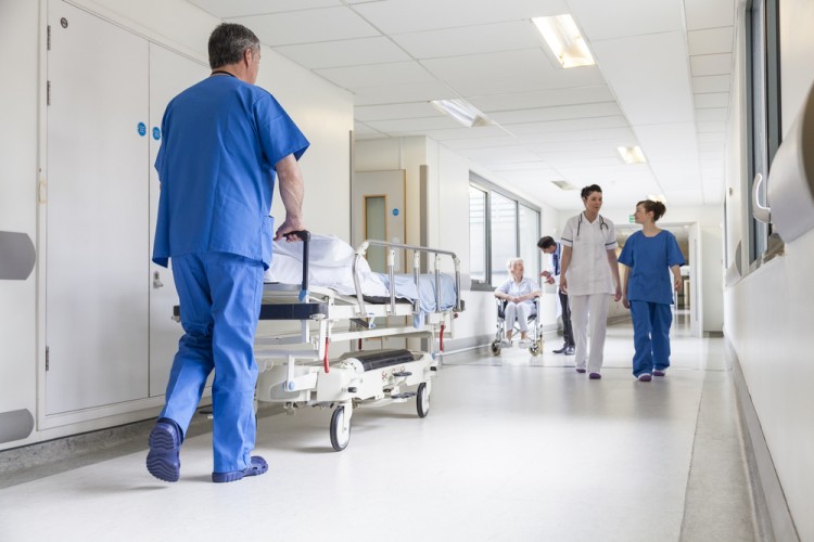 Hospital Corporation hospital stocks CYH HCA THC UHS patient, corridor, doctor, bed, care, clinic